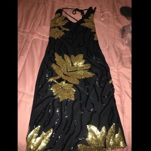 Sexy shiny mini dress with open back!